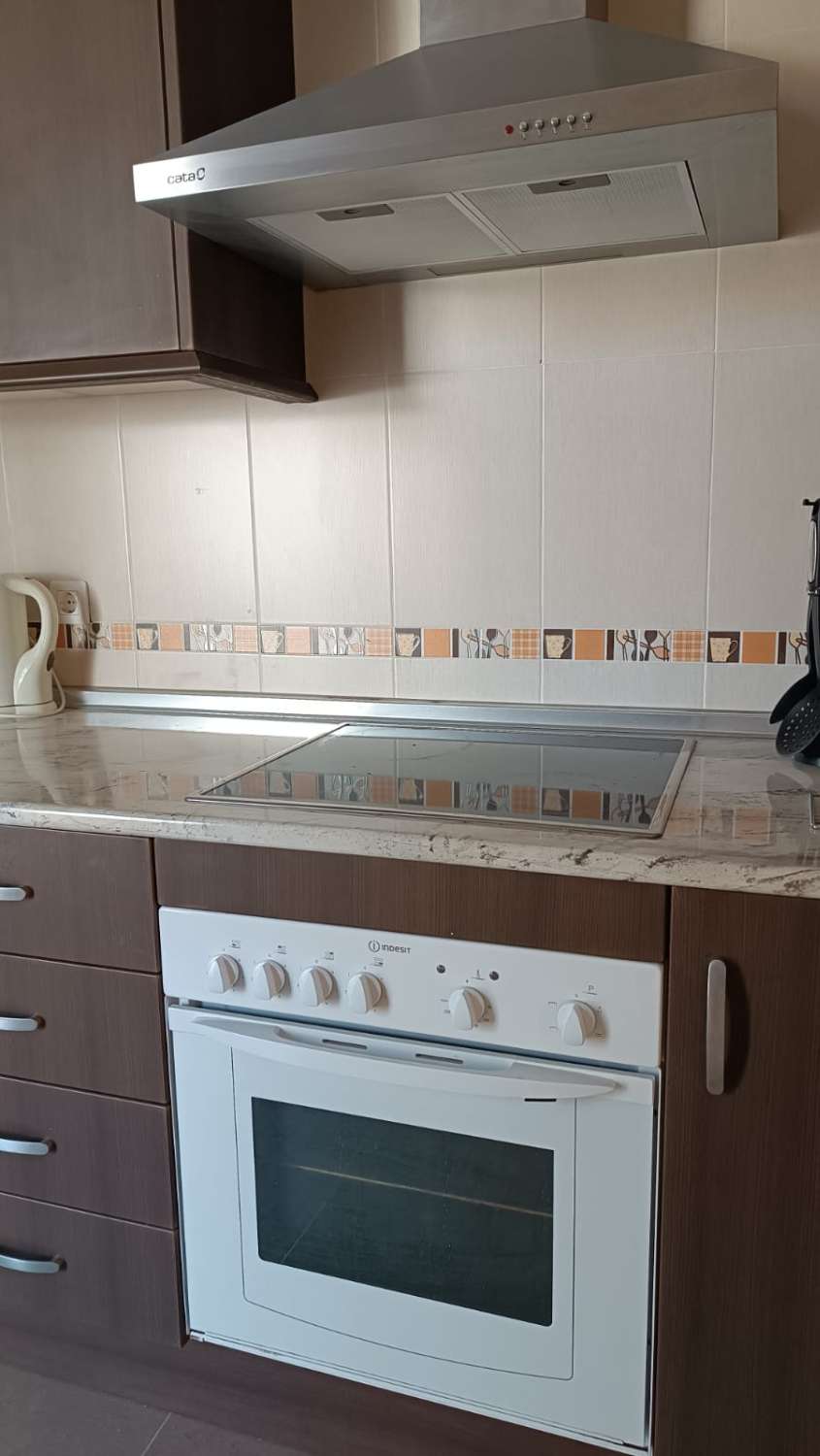 Moderna casa adosada en atractivo complejo con piscina comunitaria, a 35 kilómetros de la ciudad de Granada