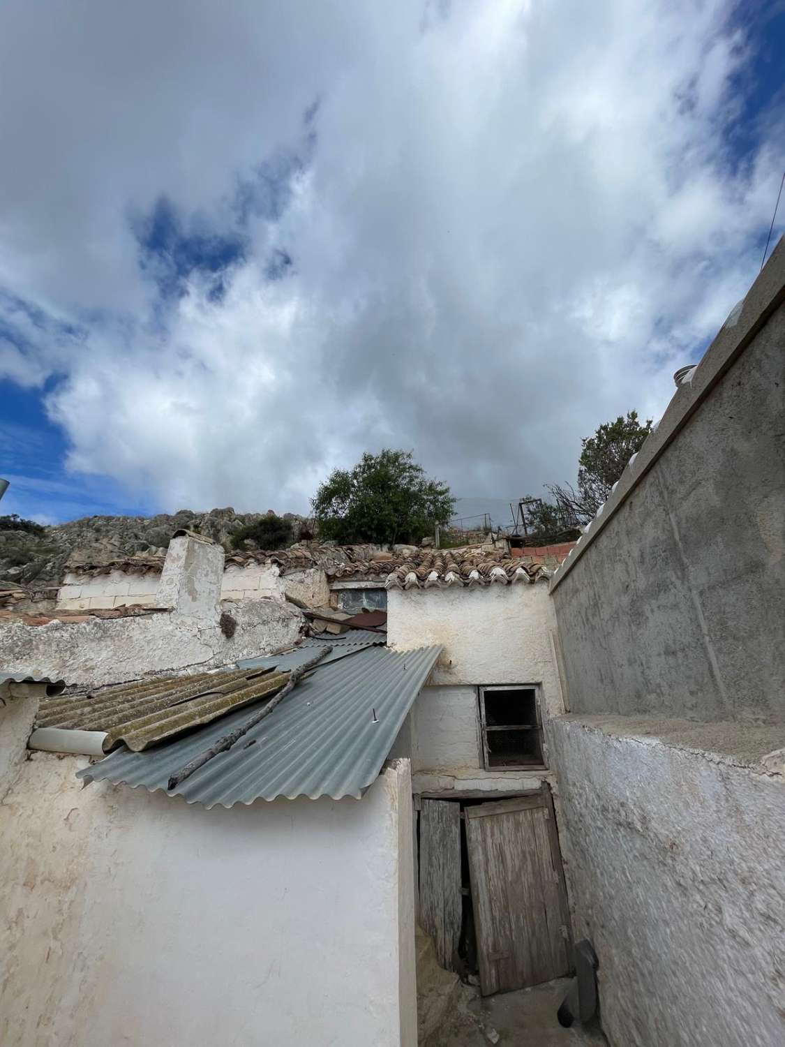 4 bed, 2 bath house with land going up into mountain