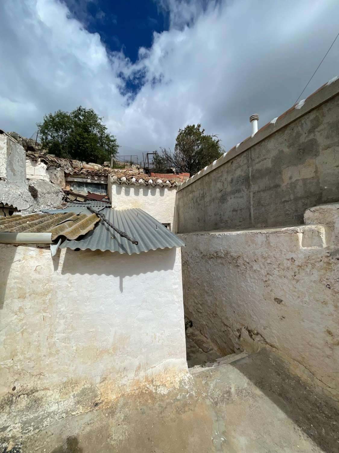 4 bed, 2 bath house with land going up into mountain