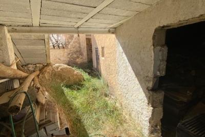 Wood shed, house to be finished  and land in stunning location of Velez Blanco