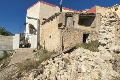 Wood shed, house to be finished  and land in stunning location of Velez Blanco