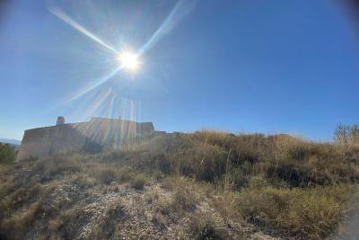 Wood shed, house to be finished  and land in stunning location of Velez Blanco