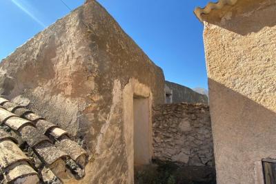 Wood shed, house to be finished  and land in stunning location of Velez Blanco