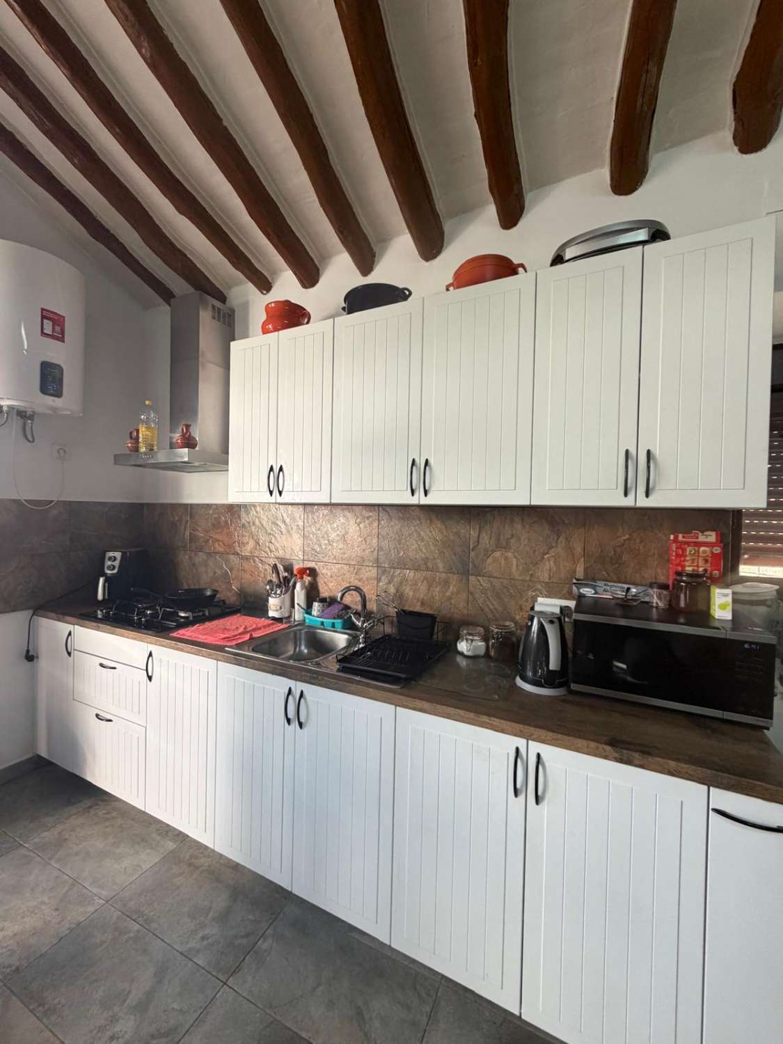 # A Beautifully Renovated 6-Bedroom Old Mill House with Separate Studio, Large Garage, set on a 10,000m² Plot