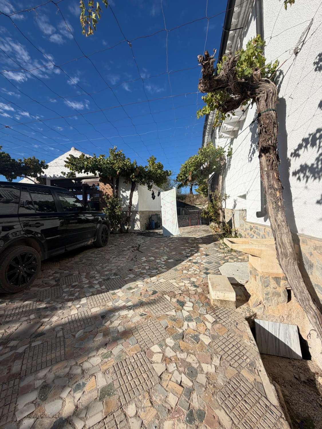 # A Beautifully Renovated 6-Bedroom Old Mill House with Separate Studio, Large Garage, set on a 10,000m² Plot